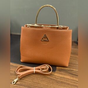 Loungefly
Harry Potter
Deathly Hallows Elder Wand Handbag